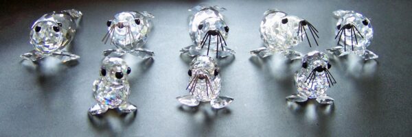 Swarovski_seal_large_v2_silver_whiskers_usa_012261 | The Crystal Lodge