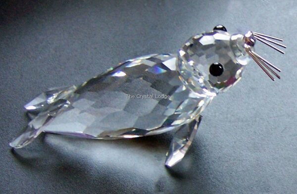 Swarovski_seal_large_v2_silver_whiskers_usa_012261 | The Crystal Lodge