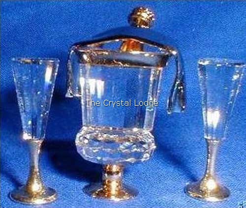 Swarovski_sparkling_wine_cooler_and_flutes_gold_191586 | The Crystal Lodge